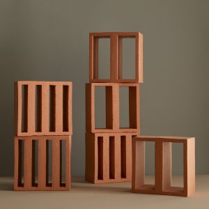 Gårdrum med mur af Tally Outdoor