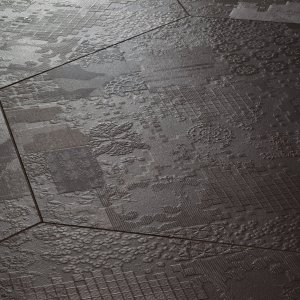 Déchirer porcelænsgulv fra Mutina med betoneffekt-relief