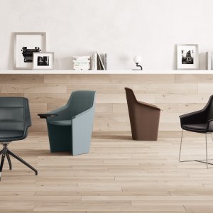 Detalje af den håndværksmæssige tone-i-tone-quiltning på Jera Chair